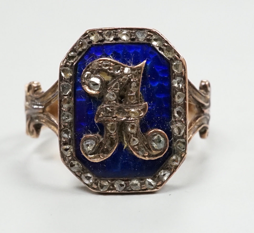 A 19th century yellow metal (stamped 18), enamel and rose cut diamond set initial ring, size H/I, gross weight 4.9 grams.